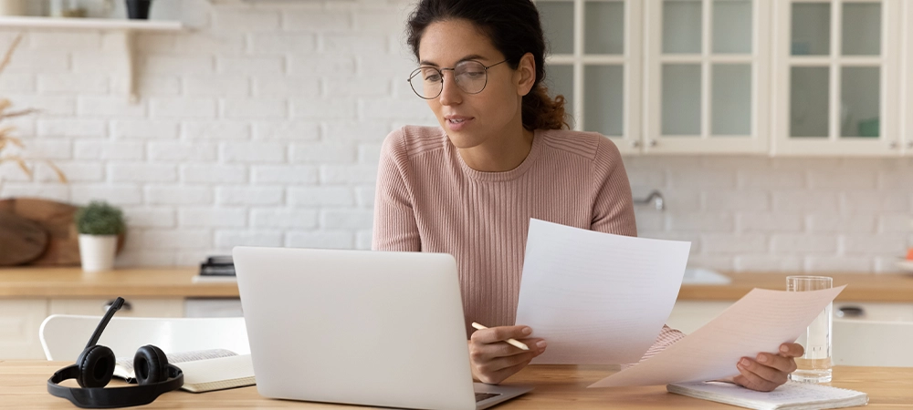 women comparing different insurance policies