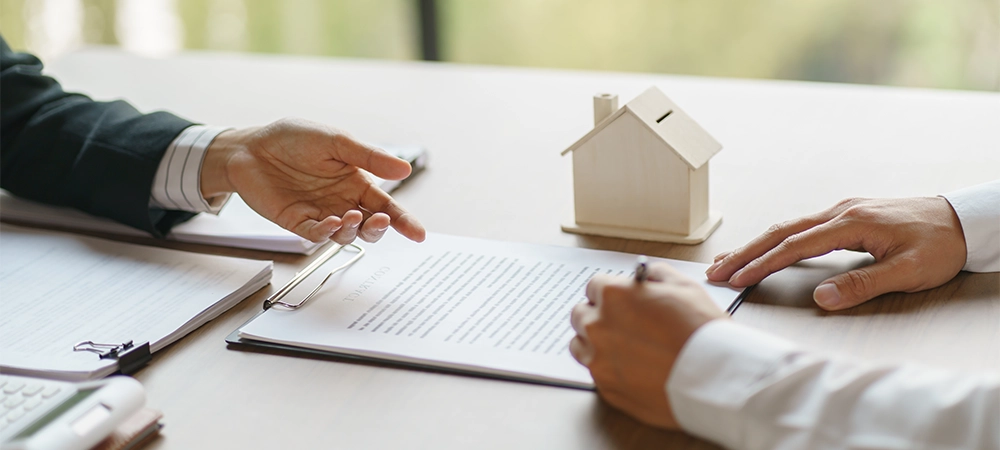 Business people signing contract making deal with real estate agent Concept for consultant home insurance Real estate investment Property insurance security. Real estate agent offer house.