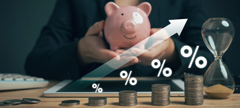 Savings dividend percentage. Financial planning concepts. Interest dividends from fixed deposits. Financial insurance premiums. Retirement money. Results of bracelets from investing in stocks.